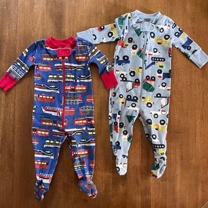 Two Hanna Andersson Pajamas 0-3 months, trains & trucks
